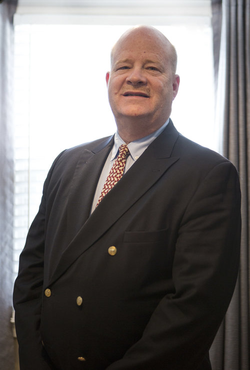 Photo of Richard Paul Stone standing in a suit