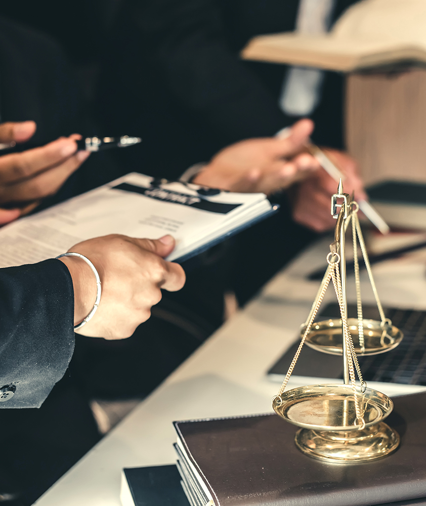 Two people having a discussion in a law office