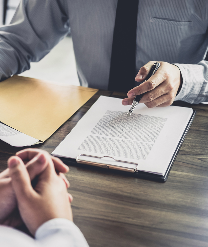 Two people having a meeting at a desk