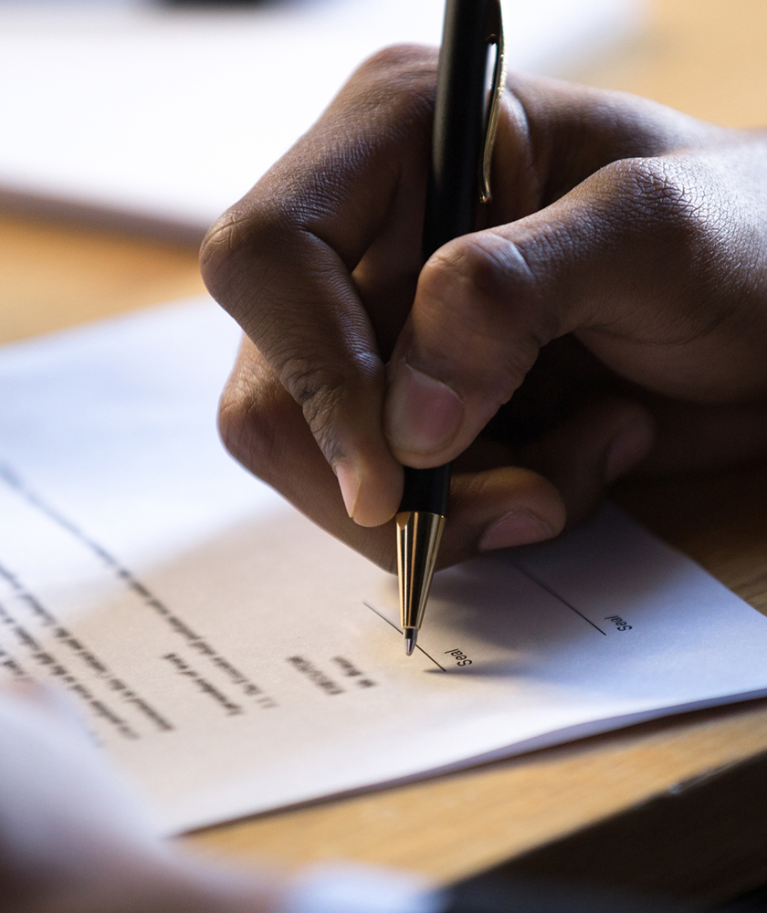 Person signing a contract